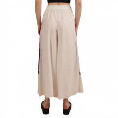 Pantaloni albi cu broderie rosie